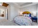 Stylish bedroom with a colorful bedspread, a yellow headboard, and coordinated decor at 301 Oldvine Dr, Lawrenceville, GA 30044
