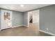Basement entrance and open floor plan with a staircase to upper level, providing easy access at 3672 Howell Wood Nw Trl, Duluth, GA 30096