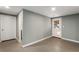 View of the basement showing doors and access to other rooms, providing ample space at 3672 Howell Wood Nw Trl, Duluth, GA 30096