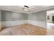 Spacious dining room with hardwood floors, crown molding, and modern lighting fixture at 3672 Howell Wood Nw Trl, Duluth, GA 30096