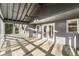Covered patio with high vaulted ceilings, ceiling fan, and natural sunlight offering a nice outdoor space at 3672 Howell Wood Nw Trl, Duluth, GA 30096