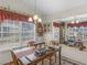 Charming dining room with natural light, perfect for Gathering gatherings and entertaining guests at 507 Mockingbird Ln, Loganville, GA 30052