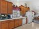 Functional kitchen features ample counter space and storage, plus stainless-steel appliances at 507 Mockingbird Ln, Loganville, GA 30052