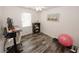 Versatile bedroom space with wood-look floors, a ceiling fan, and room for an office at 70 Oaklake Dr, Covington, GA 30016