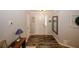 Inviting entryway with wood-look floors, neutral walls, and stylish decor at 70 Oaklake Dr, Covington, GA 30016