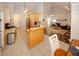 Well-equipped kitchen with stainless steel appliances open to the living area at 70 Oaklake Dr, Covington, GA 30016