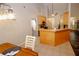 Functional kitchen with bar seating and a seamless transition to the dining area at 70 Oaklake Dr, Covington, GA 30016