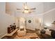 Spacious living room featuring a fireplace, modern furnishings, and wood-look floors at 70 Oaklake Dr, Covington, GA 30016