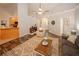 Spacious living room featuring a fireplace, modern furnishings, and wood-look floors at 70 Oaklake Dr, Covington, GA 30016