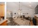 Cozy living room with vaulted ceiling, stone fireplace, and neutral decor at 70 Oaklake Dr, Covington, GA 30016