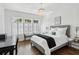 Bright bedroom with hardwood floors and a decorative screen at 907 Piedmont Ne Ave # 7, Atlanta, GA 30309