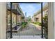 Courtyard view with brick building, balconies and beautifully landscaped garden at 907 Piedmont Ne Ave # 7, Atlanta, GA 30309