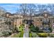 Beautiful brick apartment building featuring manicured landscaping and a central courtyard at 907 Piedmont Ne Ave # 7, Atlanta, GA 30309