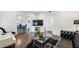This living room showcases wood flooring, comfortable seating, and a modern design at 907 Piedmont Ne Ave # 7, Atlanta, GA 30309