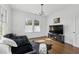 Cozy living room with hardwood floors, large window and contemporary decor at 907 Piedmont Ne Ave # 7, Atlanta, GA 30309