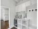 Mud room with custom cabinets, counter space, and a beverage refrigerator at 907 Piedmont Ne Ave # 7, Atlanta, GA 30309