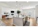 Spacious kitchen with granite counters opens to the living and dining areas, creating an open concept at 125 Sunland Blvd, Mcdonough, GA 30253