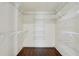 Spacious walk-in closet with custom shelving offering ample storage and organization at 1989 Mount Vernon Rd, Atlanta, GA 30338