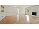 Spacious living room with fireplace, ceiling fan and large windows allowing lots of natural light at 1989 Mount Vernon Rd, Atlanta, GA 30338