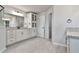 Bathroom featuring double vanities and granite countertops offering plenty of space at 220 Eastmark Way, Fayetteville, GA 30214