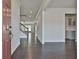 Elegant entryway featuring hardwood floors, staircase, and recessed lighting at 220 Eastmark Way, Fayetteville, GA 30214