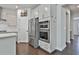 Close up of stainless steel refrigerator and ovens at 220 Eastmark Way, Fayetteville, GA 30214