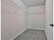 Walk-in closet featuring built-in wire shelving, providing ample storage space at 220 Eastmark Way, Fayetteville, GA 30214