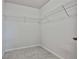 Walk-in closet with built-in wire shelving for optimal organization at 220 Eastmark Way, Fayetteville, GA 30214