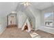Large upstairs bedroom with teepee, built in bench, and interesting ceiling lines at 3015 Foxhall Overlook, Roswell, GA 30075
