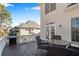 A backyard deck features outdoor seating and a grill, perfect for entertaining and relaxation at 3015 Foxhall Overlook, Roswell, GA 30075