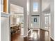 Grand entrance featuring hardwood floors, a chandelier, and an open view into the dining room at 3015 Foxhall Overlook, Roswell, GA 30075