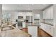 Modern kitchen featuring stainless steel appliances, granite countertops, and ample cabinet space at 3015 Foxhall Overlook, Roswell, GA 30075