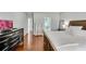 Comfortable main bedroom featuring hardwood floors and plenty of space and natural light at 3015 Foxhall Overlook, Roswell, GA 30075