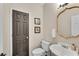 Classic powder room featuring pedestal sink, elegant mirror, and neutral decor at 3015 Foxhall Overlook, Roswell, GA 30075