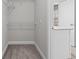 Walk-in closet with wire shelving for organized storage solutions at 3575 Bonneville Dr, Cumming, GA 30041