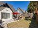 Grassy backyard featuring patio, privacy fence, and charming landscaping at 974 Grant Se St, Atlanta, GA 30315