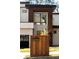 Close-up of a wooden address post for a modern two-story home at 1051 Wimberly Ne Rd, Brookhaven, GA 30319