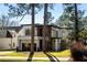 Modern two-story home with unique architectural features and large windows at 1051 Wimberly Ne Rd, Brookhaven, GA 30319