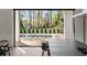 Modern kitchen with a large island and sliding glass doors to a backyard with a pool at 1051 Wimberly Ne Rd, Brookhaven, GA 30319