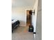 Bedroom with a bed and a closet with clothes at 224 Crest Creek Way, Villa Rica, GA 30180