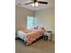 Bedroom with a twin bed, nightstand, and natural light at 224 Crest Creek Way, Villa Rica, GA 30180