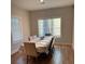 Bright dining room with large windows, and an inviting atmosphere at 224 Crest Creek Way, Villa Rica, GA 30180