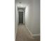 Hallway with neutral walls and carpet flooring at 224 Crest Creek Way, Villa Rica, GA 30180