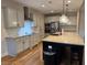 Modern kitchen featuring stainless steel appliances, granite countertops, and stylish cabinets at 224 Crest Creek Way, Villa Rica, GA 30180