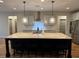 Modern kitchen featuring stainless steel appliances, granite countertops, and a stylish island with bar seating at 224 Crest Creek Way, Villa Rica, GA 30180