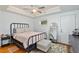 Bright bedroom with tray ceiling, ceiling fan, and hardwood floors for a cozy, inviting space at 109 Chester Se Ave, Atlanta, GA 30316