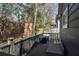 Outdoor deck perfect for relaxing and entertaining, surrounded by mature trees and landscaping at 109 Chester Se Ave, Atlanta, GA 30316