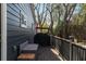 Spacious outdoor deck with a grill, ideal for outdoor cooking and enjoyment of the peaceful surroundings at 109 Chester Se Ave, Atlanta, GA 30316