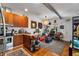 Open living room and kitchen area featuring hardwood floors and a neutral color palette at 109 Chester Se Ave, Atlanta, GA 30316