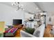 Open concept living room flowing into a modern kitchen, complete with stainless steel appliances at 109 Chester Se Ave, Atlanta, GA 30316